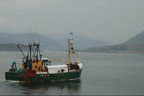 A trawler leaving the port of Ullapool, north-west Scotland. Credit: Iolaire